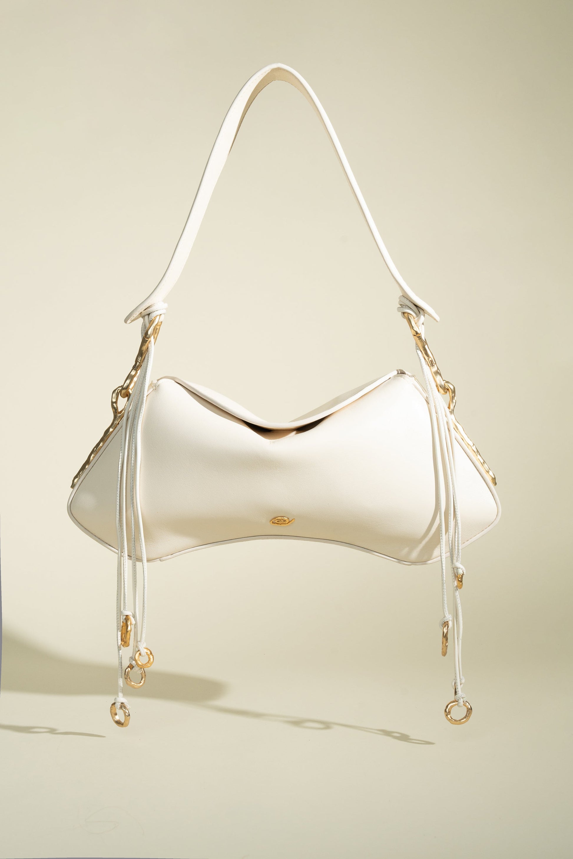  Deià handmade Nappa Leather Shoulder bag with Hanging Organic Rings senderkis cream front view