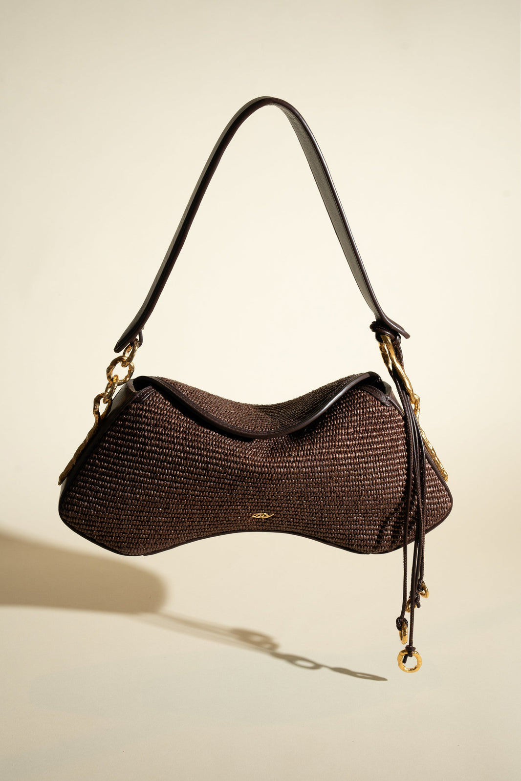  Deià handmade in Woven Natural Raffia and Nappa Leather Trim senderkis black chocolate front view